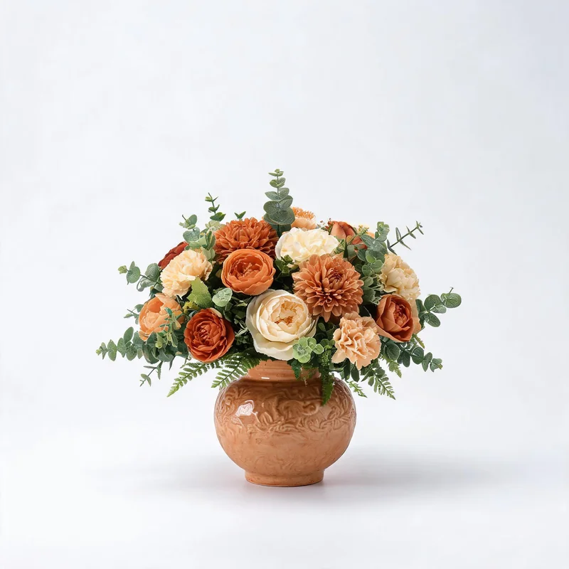 Pre-designed silk floral arrangement in a decorative ceramic vase