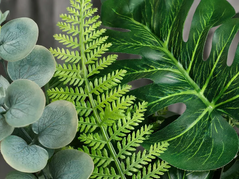 Close-up detail of artificial plant leaves showing realistic texture and veining